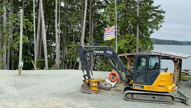 Dylan Shaw installing underground hydro line, Port Hardy