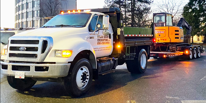 Truck and excavator in Port Hardy, Dylan Shaw